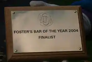Engraved plaque with scratch engraved detailed logo