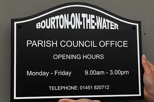 Shaped Black and White Sign