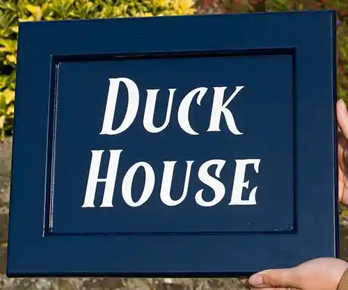 You can choose from a wide range of colours. Dark Blue House Sign