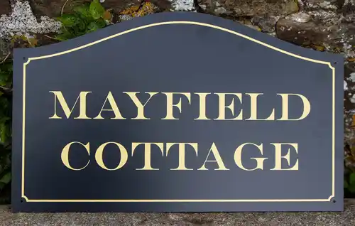 Arch top house sign, black with gold lettering