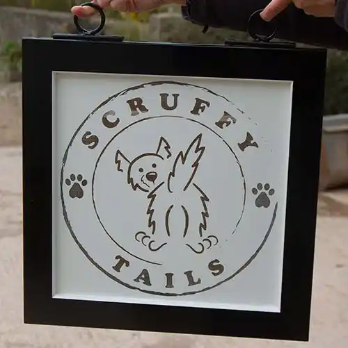Black framed sign with printed panel