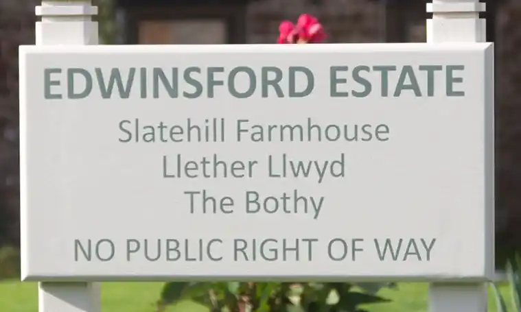 Painterd sign with lettering in Farrow and Ball Smoke Green and background in Slipper Satin