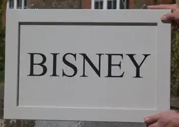 Wood house sign painted in Farrow and Ball Purbeck Stone