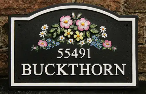 Arch top cast house sign
