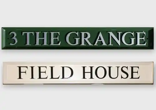 Long rectangular cast house signs