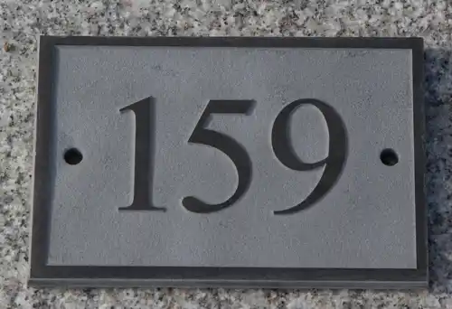 raised slate house number sign