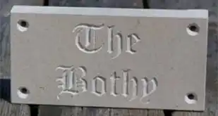 Unpainted purbeck stone sign
