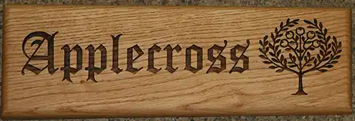 Fine detail wooden house sign