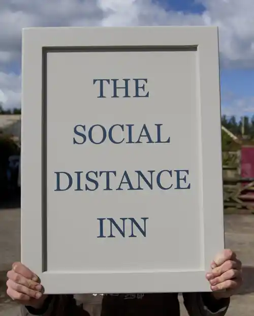 Painted wooden framed pub sign