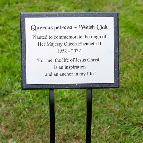 Engraved Plaque On Corian Backing Board.