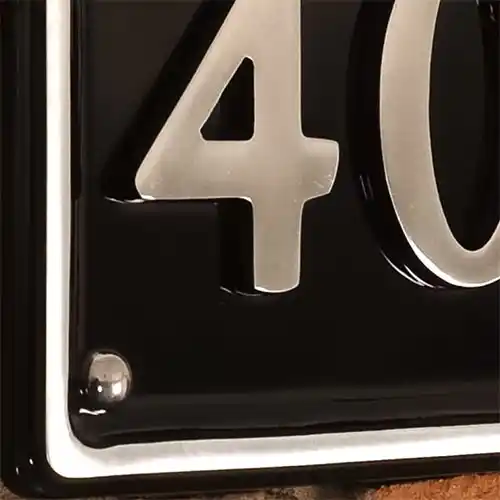 Available in six backround colours Close up of Polished Aluminium Door Number