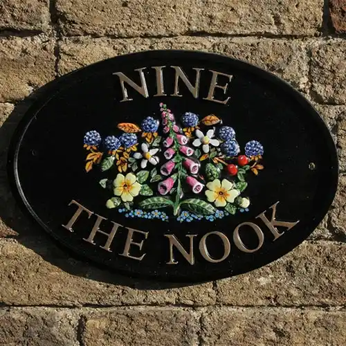 Extra flowers can be hand painted around the raised section. House sign with Flower Motif