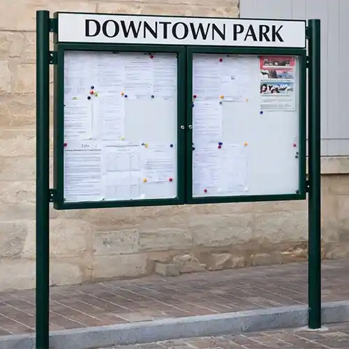 These are all waterproof and lackable Outdoor notice board with posts and header panel in town setting
